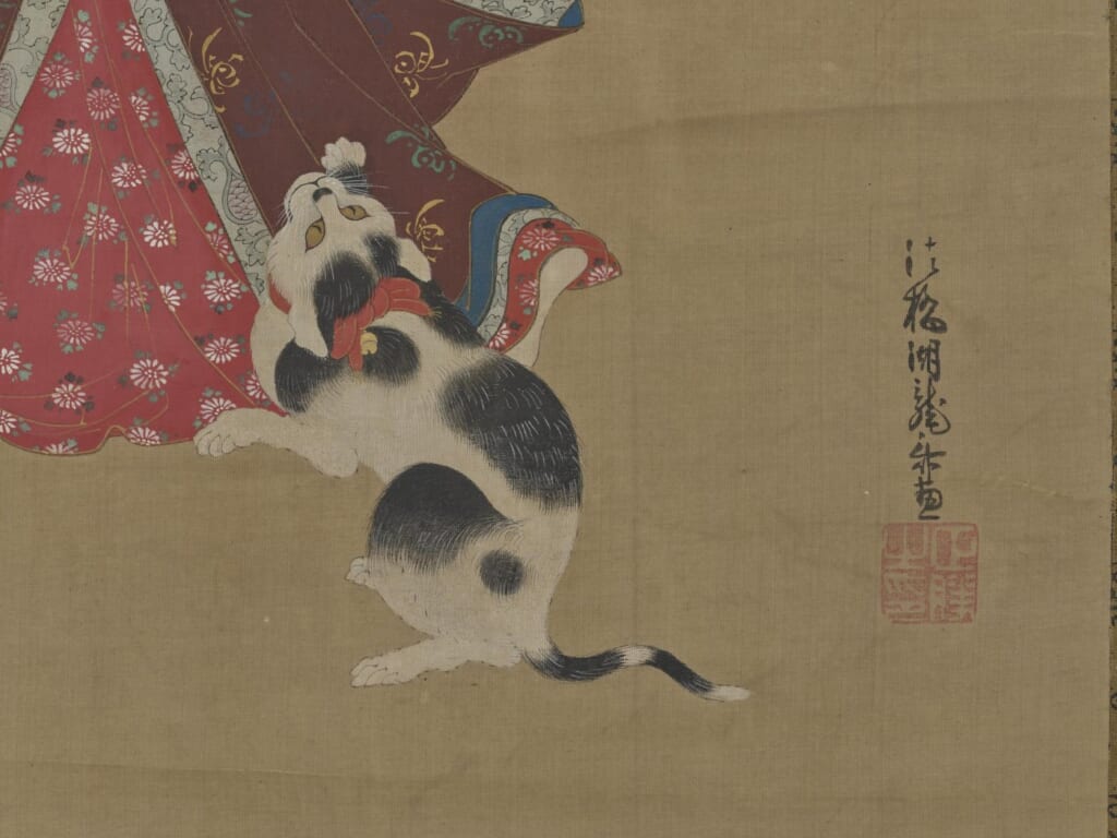 礒田湖龍斎「美人愛猫図」の部分。前足を上げて着物の裾にじゃれる猫